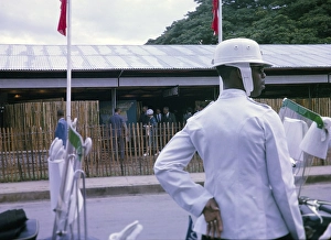 Princess Royal attending independence event in Port of Spain, Trinidad 1962 with motorcycle security official in foreground