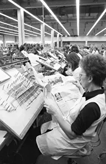The production of electronic devices by female workers at the Siemens company on 23