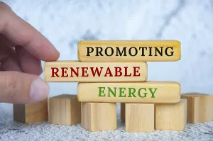 Promoting Renewable Energy text on wooden blocks