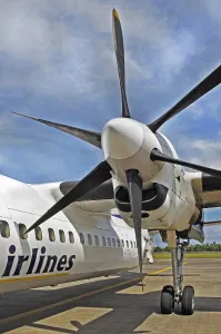 Propeller aircraft, prop jet Fokker 50, former Riau Airlines, at the airport in Labuan Bajo, Flores Island Indonesia