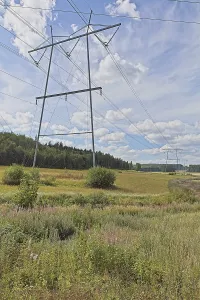 Pylon and power lines on a cloudy summer day