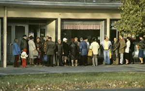 Queue outside a cooperative store