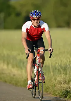Racing cyclist riding a bicycle