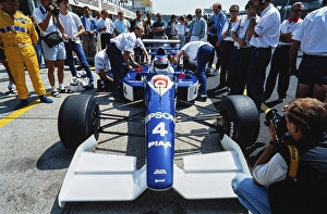 Racing driver Jean Alesi, sitting in the cockpit in the pit lane, Formula 1, Tyrrell Racing, Tyrrell 019, Ford Cosworth DFR 3.5 V8, German Grand Prix at the Hockenheimring on 29 July 1990, Germany, Europe