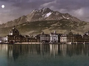 Railway station and Pilatus in the moonlight