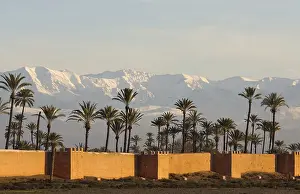 The ramparts of Marrakesh in front of the snow-capped High Atlas mountains