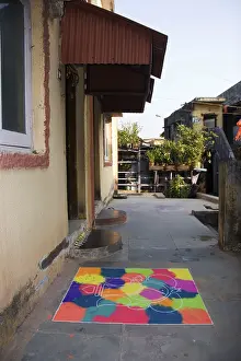 Rangoli design in front of house
