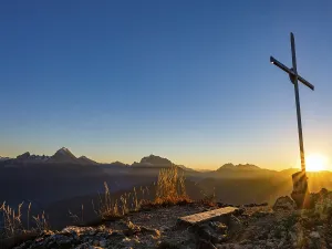 Rauher Kopf summit cross at sunset