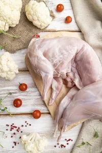 Whole raw rabbit with cauliflower