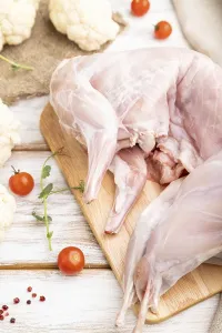 Whole raw rabbit with cauliflower