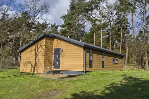 Rcreation bungalow in the middle of the forest between trees