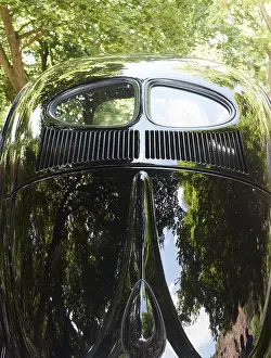 Rear view of a VW Beetle with a prezel window