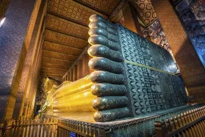 Reclining Buddha statue, mother of pearl inlays on the soles of the feet