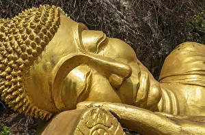Reclining Buddha statue, Phousi or Phu Si Hill