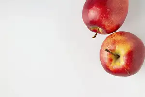 Red apples on white background