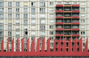 Red flags for a parade on the 25th anniversary of the Building of the Berlin Wall on Karl-Marx-Allee street