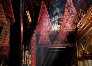 Red incense spirals at Phuoc An Hoi Quan Pagoda