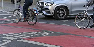 Red marked cycle path in the city centre