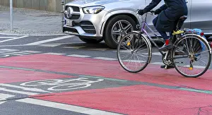 Red marked cycle path in the city centre