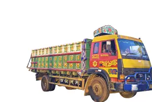 Red yellow green painted truck on white background