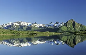 Reflection in lake of the Trolldalstinden mountains