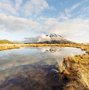 Reflection in Pouakai Tarn, stratovolcano Mount Taranaki or Mount Egmont