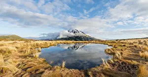 Reflection in Pouakai Tarn, stratovolcano Mount Taranaki or Mount Egmont
