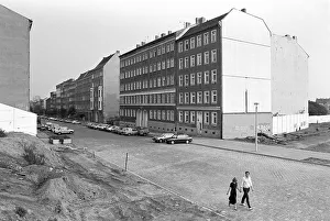 Remains of the Berlin Wall, view from the Bernauer Strasse in eastern direction in the Strelitz
