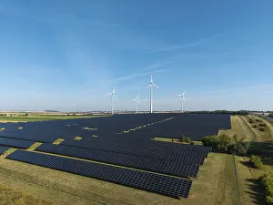 Renewable energy sources with solar and wind systems on an extensive field