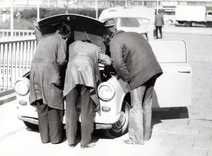 Three repair Trabbi, ca. 1980s