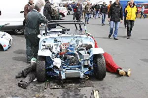 Repairing a Triumph TR3 race car