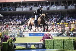 Category Historic EN Prints: Richard Vogel of Germany and riding United Touchs compete in the first round of the 1