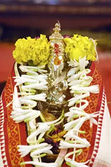 Richly decorated silver metal idol of lord Ganesh elephant headed God
