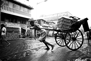 Rickshaw puller struggling Calcutta Kolkata West Bengal India Asia 1989