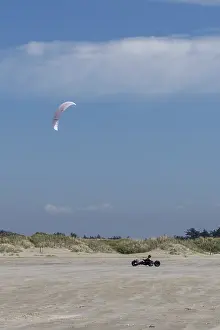 Ringby, Denmark - 30 May, 2021: kite buggy enjoying a windy day on the Wadden Sea island beaches of western Denmark