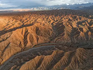 River bed runs through a landscape of eroded hills