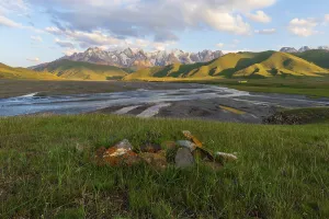 River coming from Koel-Suu mountain range at sunset