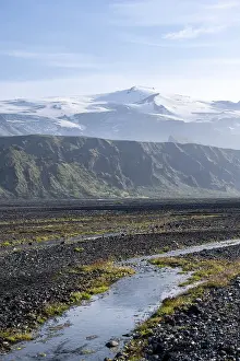 River Krossa, mountains with glacier Eyjafjallajoekull in the back