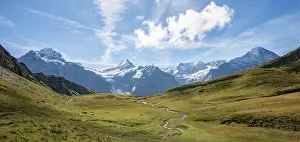 River meanders, behind snow-covered Schreckhorn