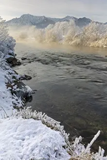 River in the morning light in front of mountains