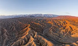Riverbed in a landscape of eroded hills