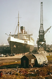 RMS Queen Mary ocean liner in dry dock, Southampton Docks, Hampshire, England, UK 1950s