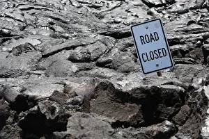 Road closed, a sign on a lava field in the eastern rift zone