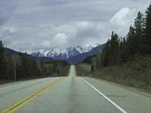 An empty road to the mountains