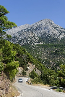 Category Mountain Landscapes Prints: Road on the west coast, with Mount Kerkis