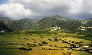 Roads for a theme park with the mountains of the Lamb Range in the background, suburb of Worree, Cairns, Queensland, Australia 1956 now Ingenia Holidays Cairns Coconut