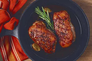 Roast duck breast, in a frying pan