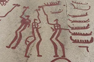 Rock carvings with figures, warriors