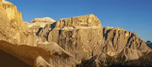Rock formations in the Dolomites in the warm light of the setting sun