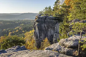 Rocks and autumnal mixed forest on the Pfaffenstein